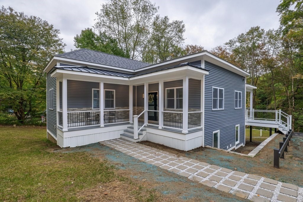63 King Road Charlton, MA 01507 - Photo 1 of 40 a front view of a house with a garden