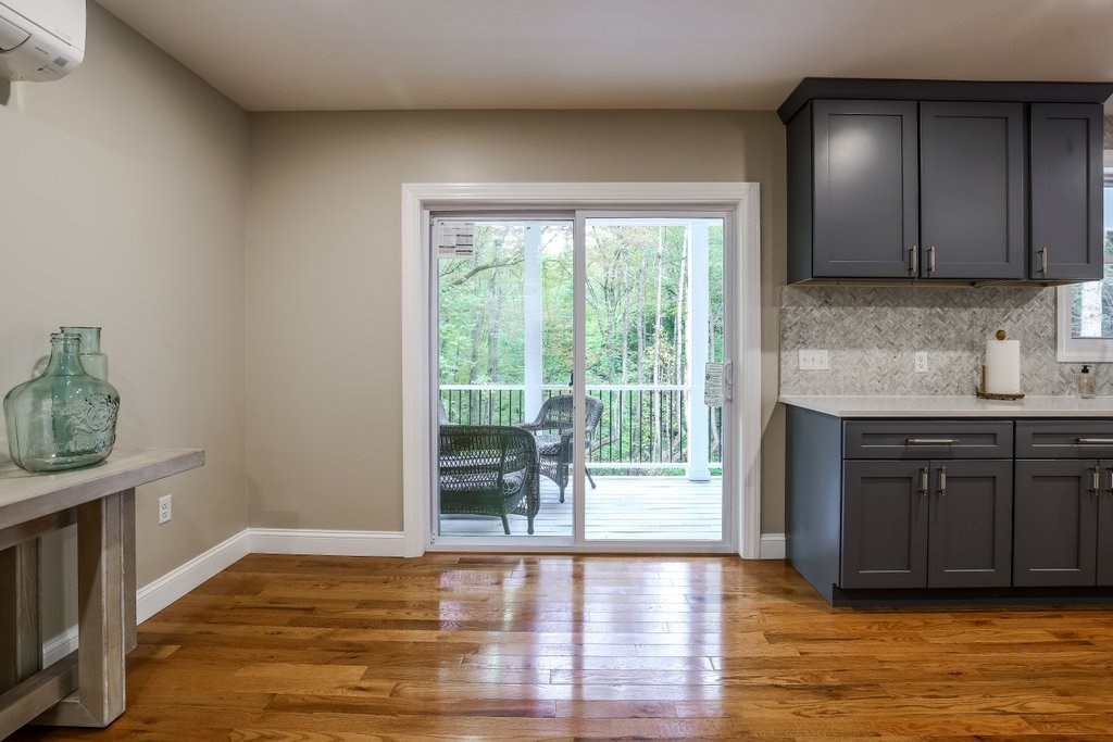 63 King Road Charlton, MA 01507 - Photo 20 of 40 a view of a kitchen with wooden floor and a sink