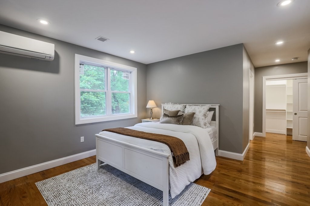 63 King Road Charlton, MA 01507 - Photo 22 of 40 a spacious bedroom with a bed and wooden floor