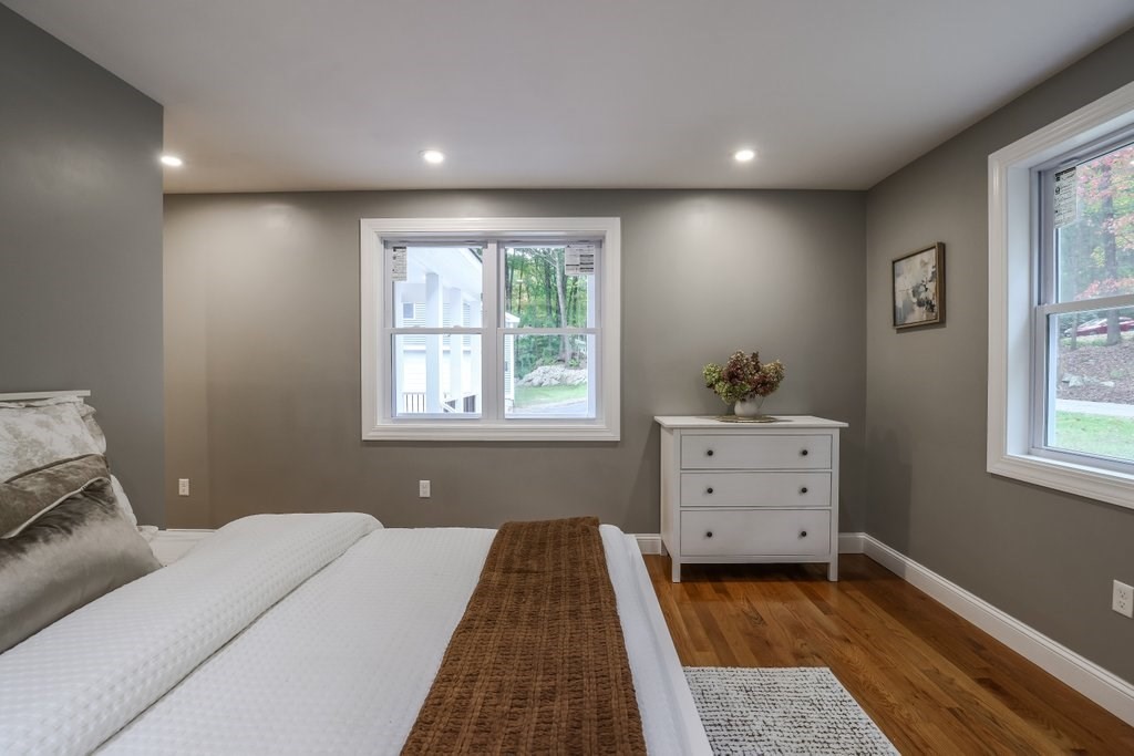 63 King Road Charlton, MA 01507 - Photo 23 of 40 a bedroom with a bed and a window