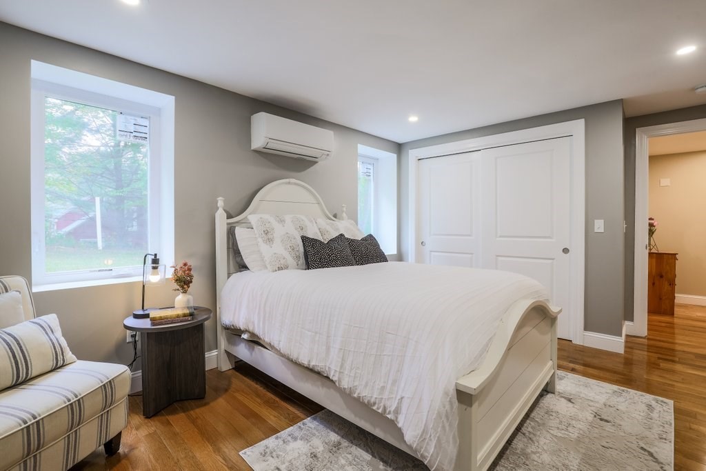 63 King Road Charlton, MA 01507 - Photo 36 of 40 a bed room with a bed and a couch