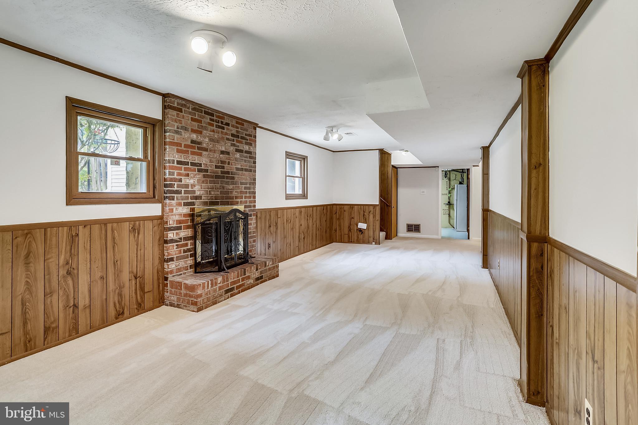 16617 Cashell Road Rockville, MD 20853 - Photo 16 of 28 Huge Family Room with Wood-burning Fireplace