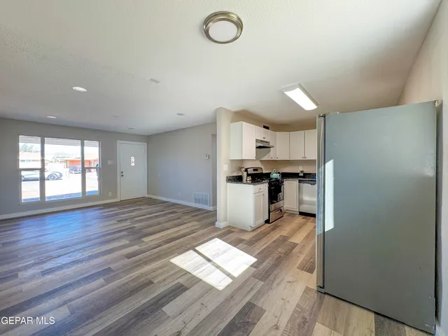 a view of a room that has a window in it