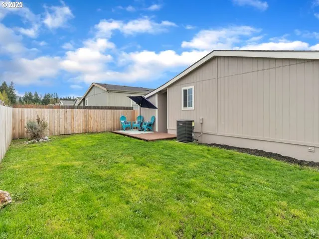 a backyard of a house with lots of green space