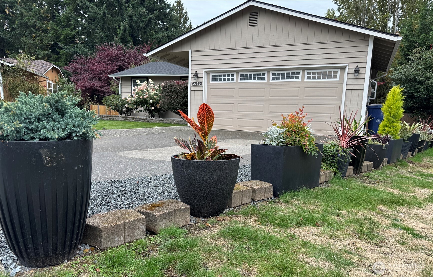 2120 178th Street Southeast Bothell, WA 98012 - Photo 3 of 38 a view of a house with backyard and garden