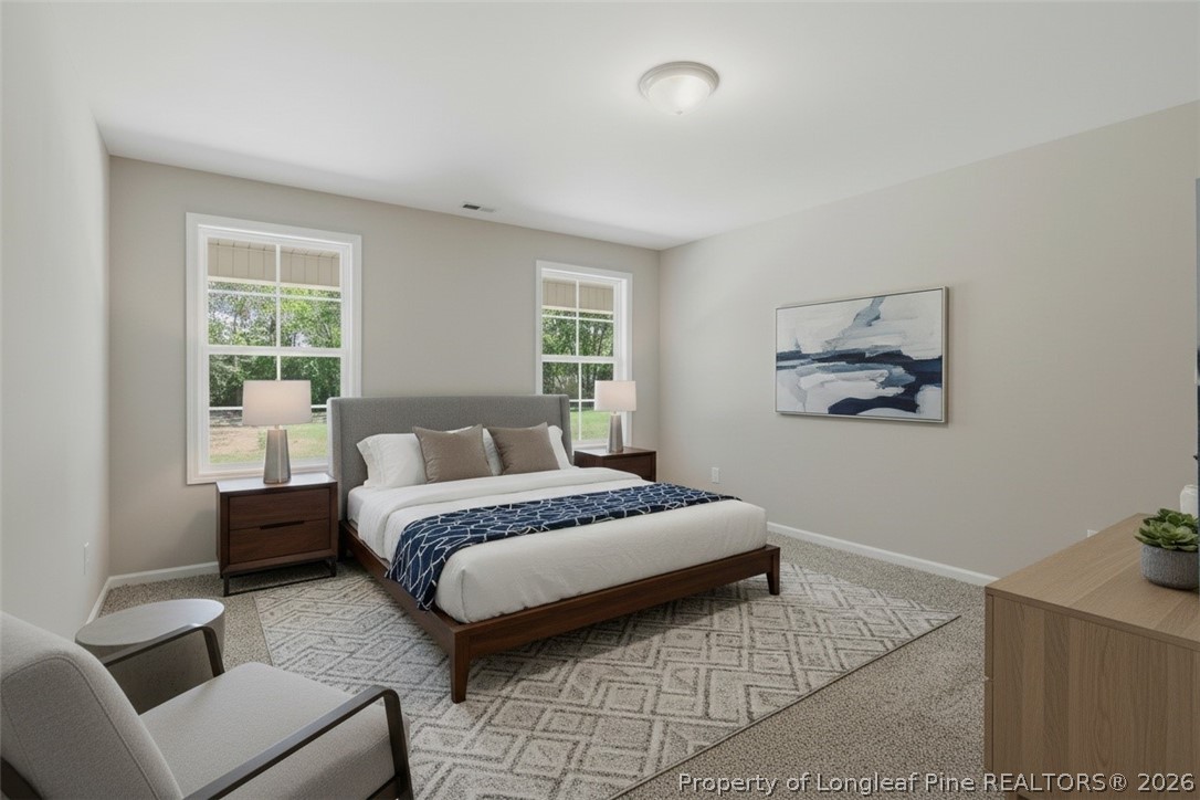 219 South 5th Street Spring Lake, NC 28390 - Photo 25 of 49 Master bedroom staged