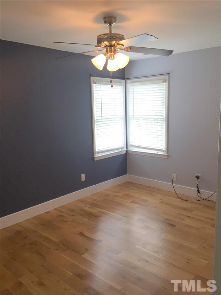 11309 North Radner Way Raleigh, NC 27613 - Photo 13 of 25 a view of an empty room with window