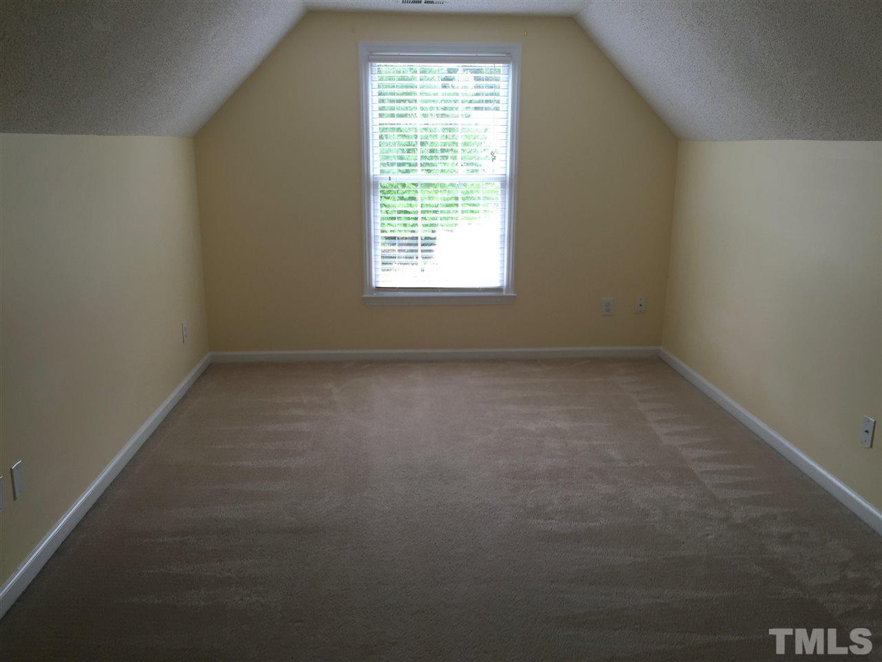 11309 North Radner Way Raleigh, NC 27613 - Photo 22 of 25 an empty room with a window