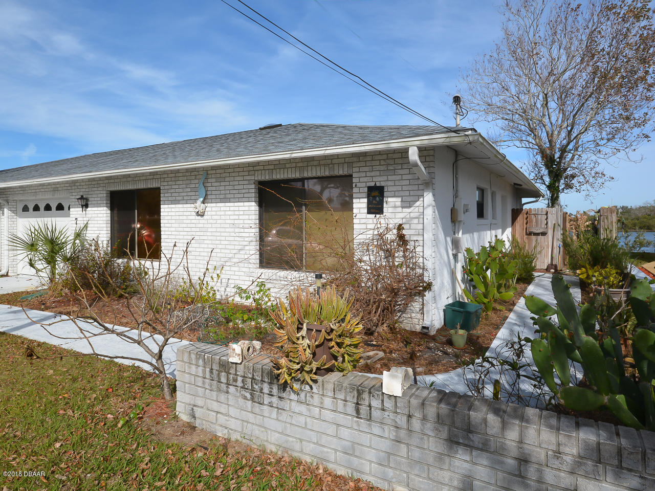 7 Pelican Lane Edgewater, FL 32141 - Photo 1 of 27 7_PelicanLane-1