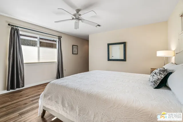 a bathroom with a shower and a bath tub