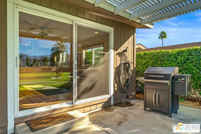 a view of a lake with a house in the background