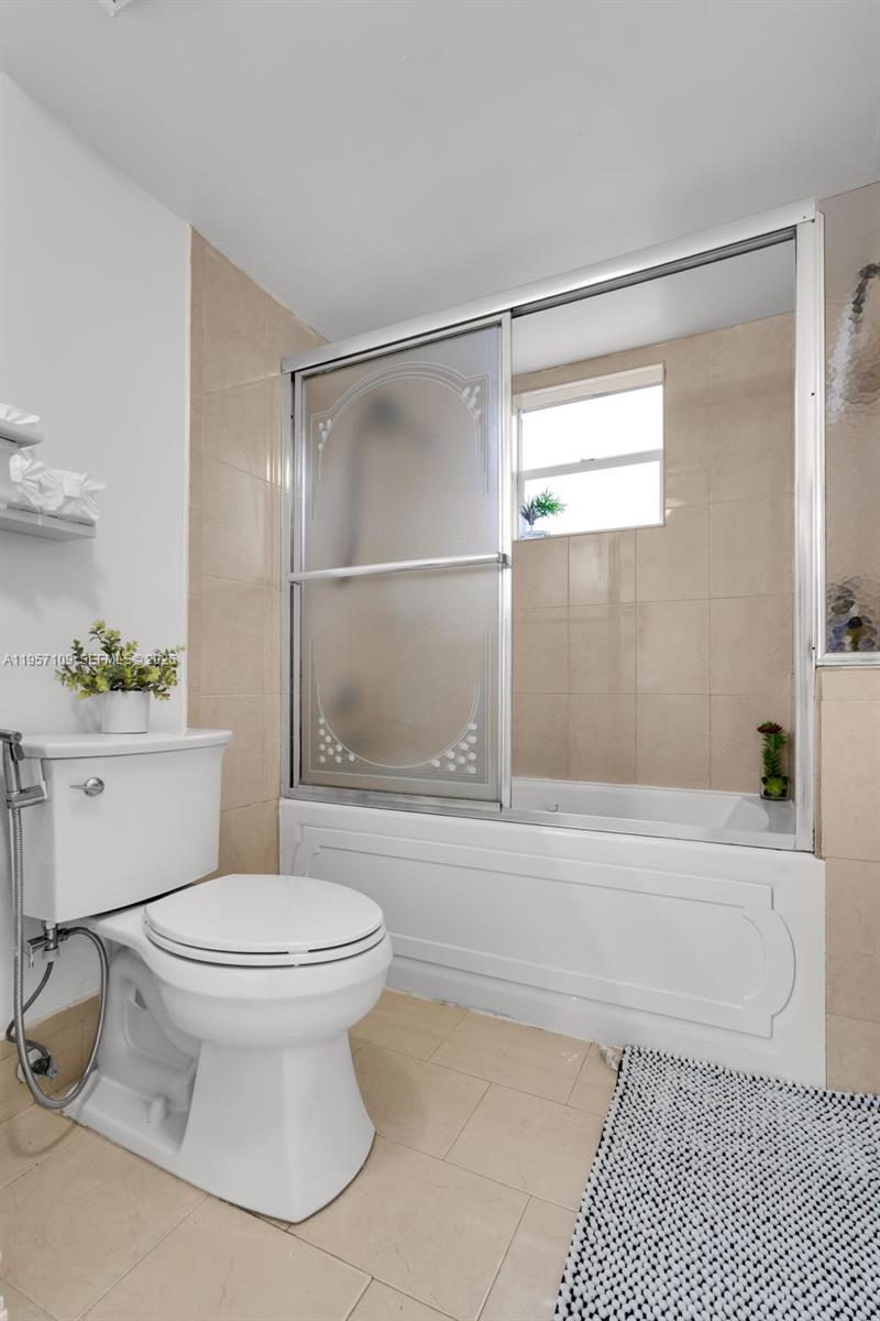 7531 West 29th Way, Unit 7531 Hialeah, FL 33018 - Photo 15 of 30 a bathroom with a toilet and a shower