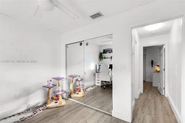 a view of livingroom with furniture and wooden floor