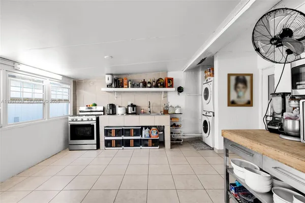 a view of kitchen with cabinets and stainless steel appliances