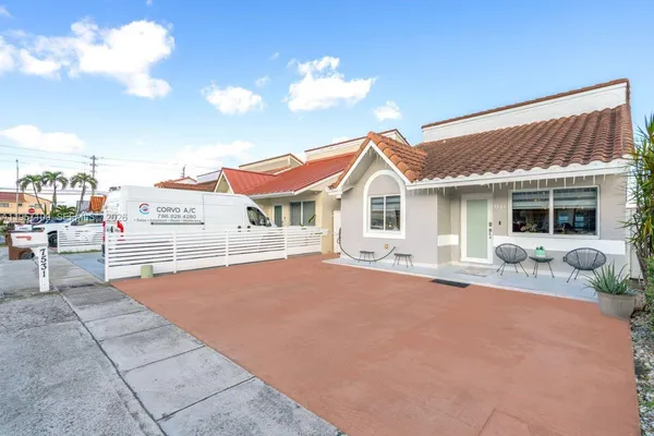 a view of a house with a patio
