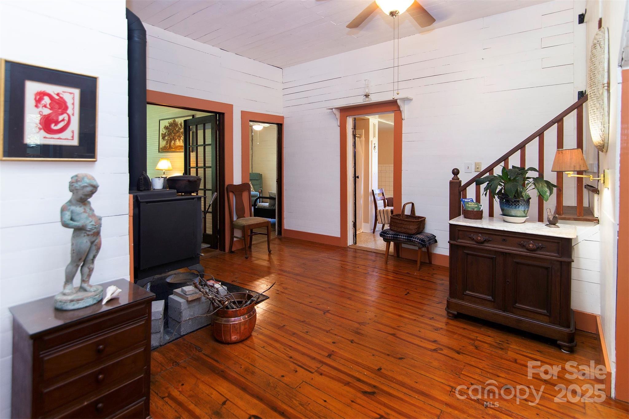 8430 Reeps Grove Church Road Vale, NC 28168 - Photo 11 of 42 a living room with furniture and a fireplace