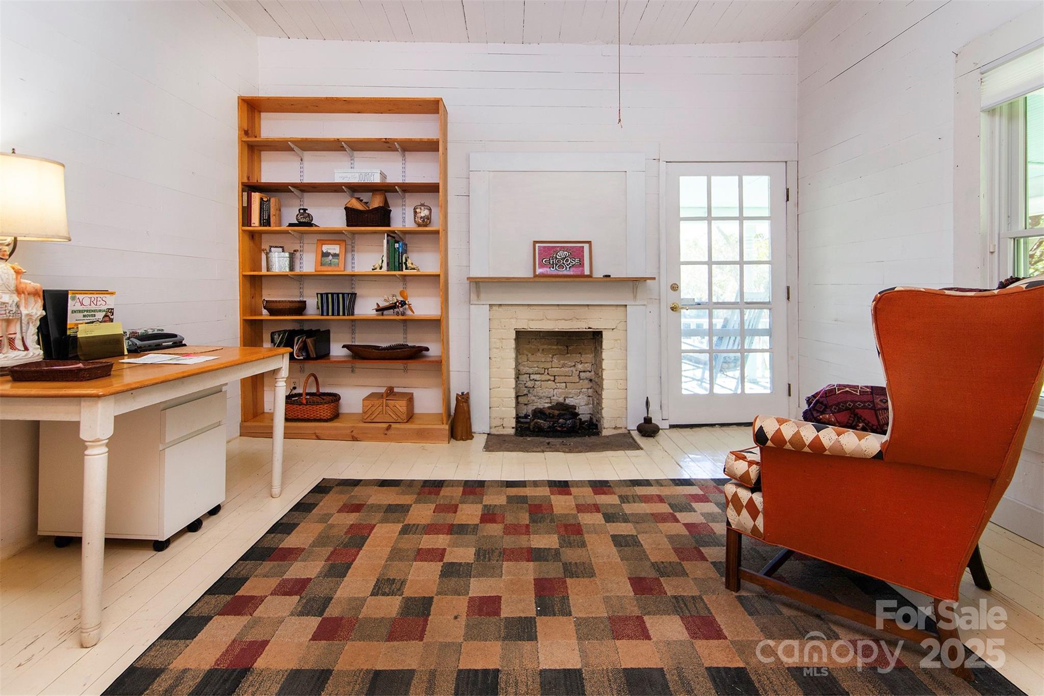 8430 Reeps Grove Church Road Vale, NC 28168 - Photo 17 of 42 a living room with furniture and a fireplace