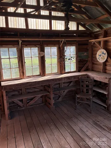 a view of a chairs and table on the deck