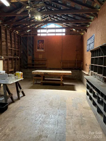 a view of an empty room with furniture