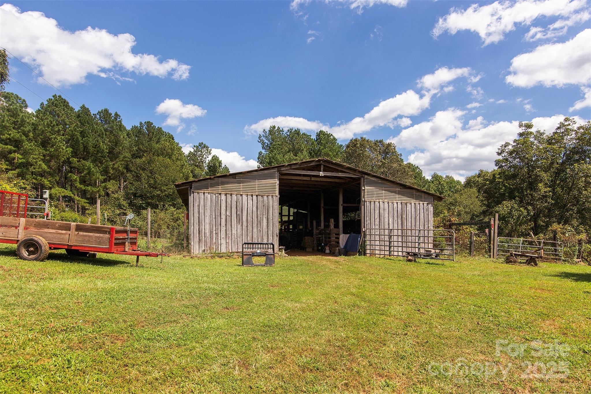 8430 Reeps Grove Church Road Vale, NC 28168 - Photo 36 of 42 a view of a house with yard and sitting area