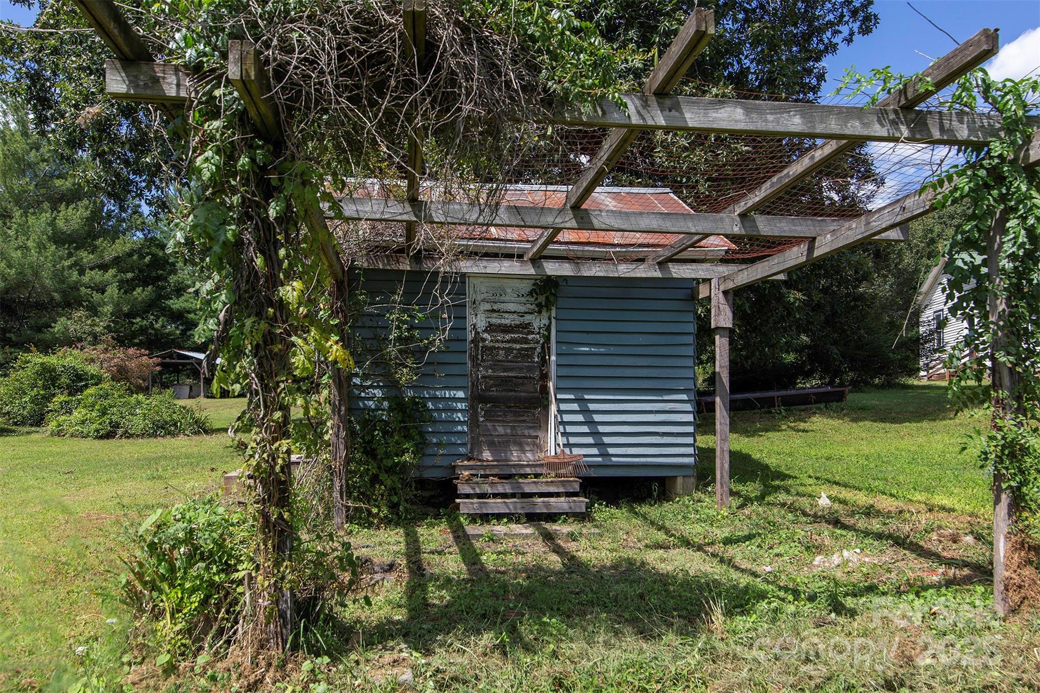 8430 Reeps Grove Church Road Vale, NC 28168 - Photo 38 of 42 a front view of a house with a yard