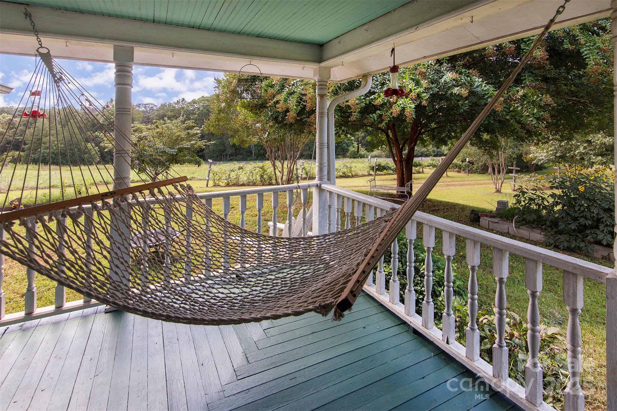 8430 Reeps Grove Church Road Vale, NC 28168 - Photo 4 of 42 a view of balcony with wooden floor and outdoor seating
