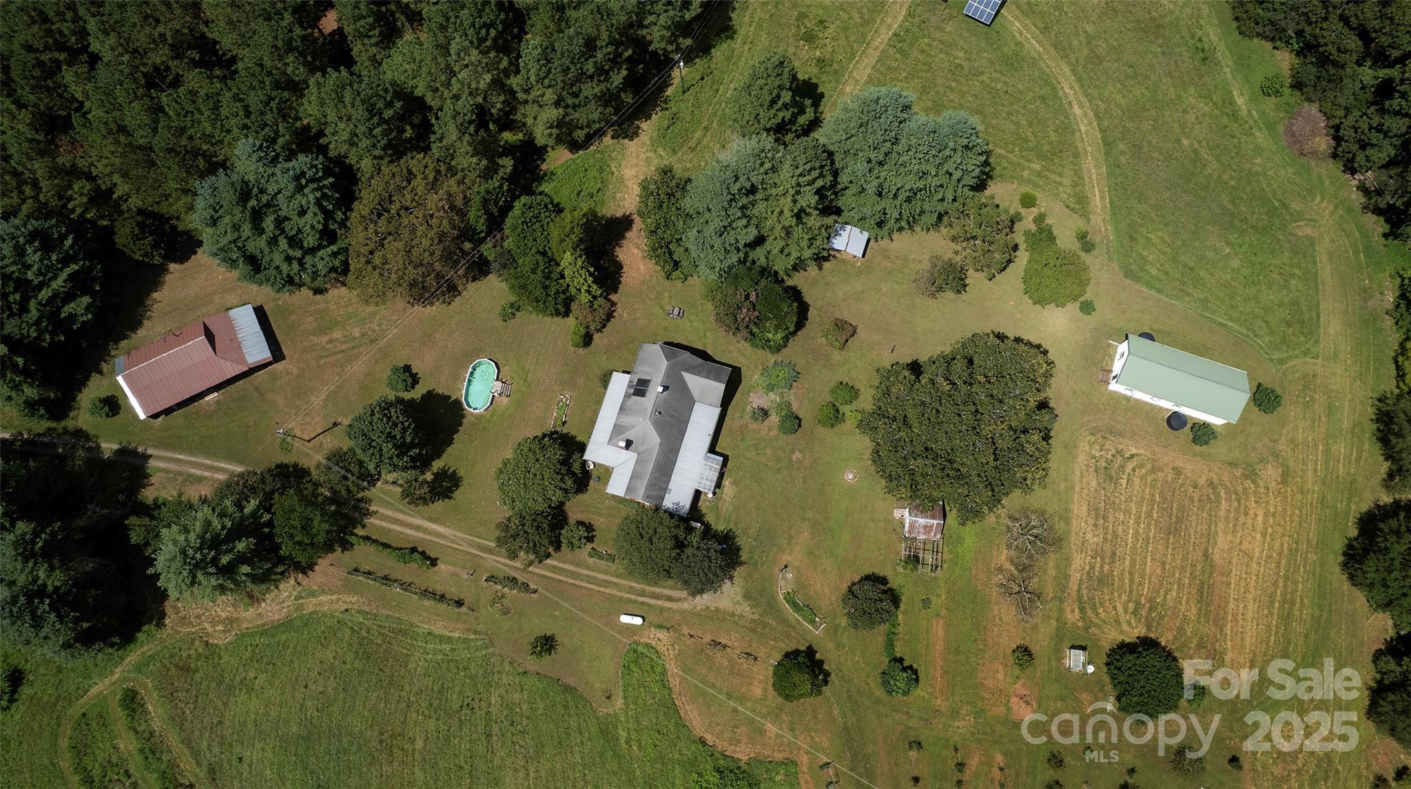 8430 Reeps Grove Church Road Vale, NC 28168 - Photo 6 of 42 an aerial view of a house with a yard