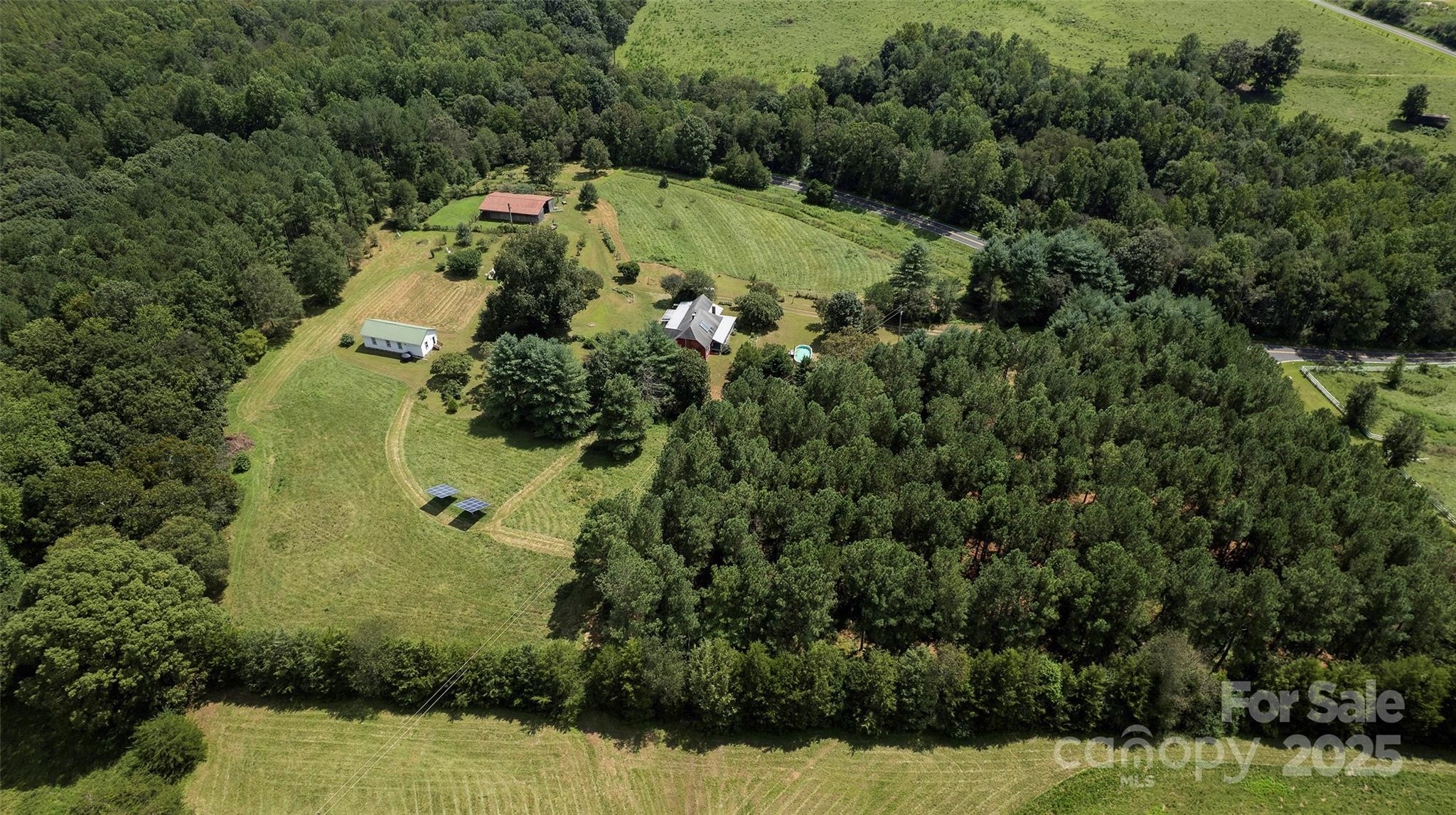 8430 Reeps Grove Church Road Vale, NC 28168 - Photo 7 of 42 an aerial view of a house with a yard