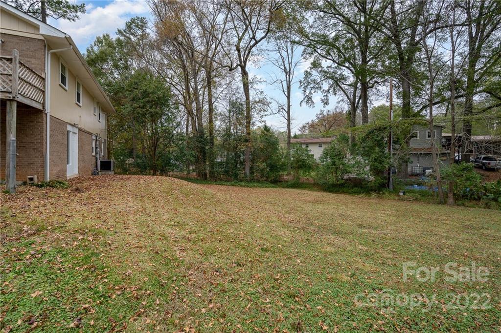 1500 Rama Road Charlotte, NC 28211 - Photo 23 of 25 a backyard of a house with lots of green space