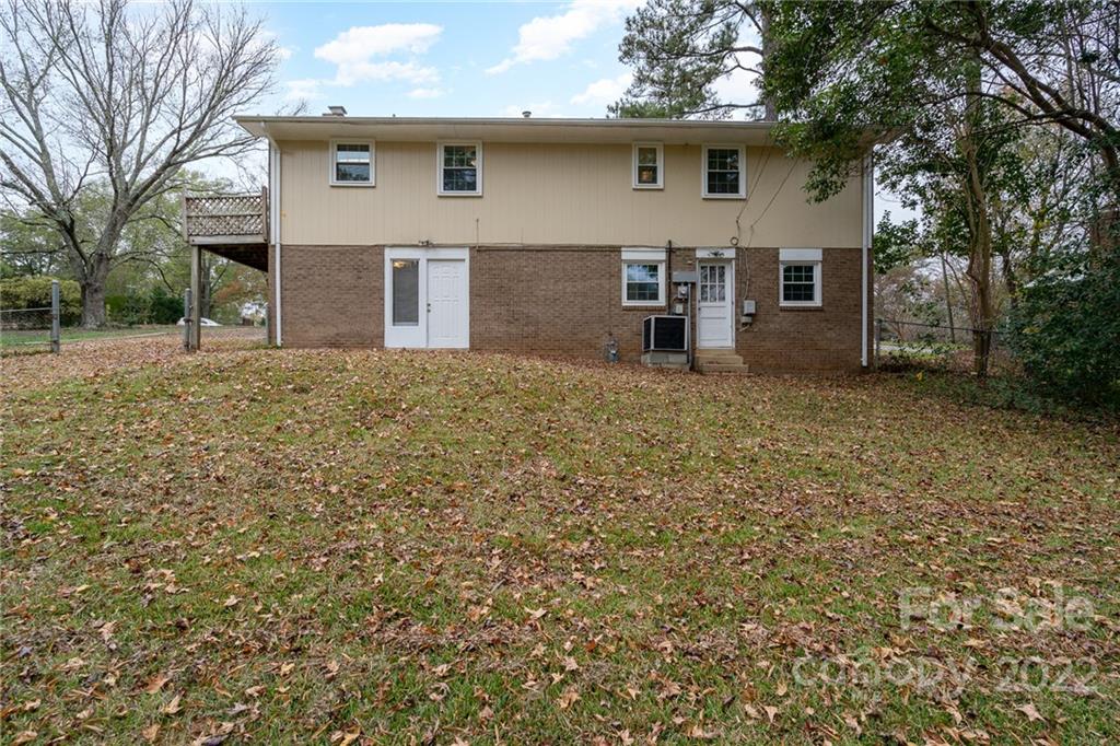 1500 Rama Road Charlotte, NC 28211 - Photo 24 of 25 a front view of a house with a yard and garage