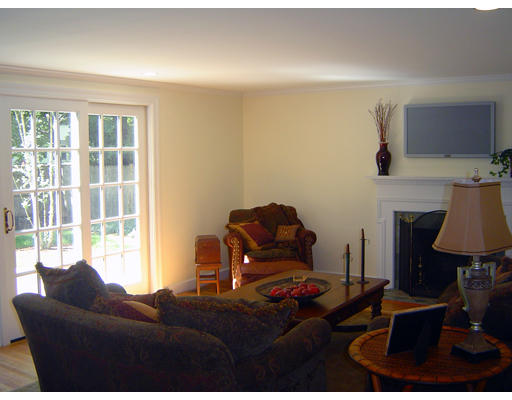 23 Auburn Road Wellesley, MA 02481 - Photo 8 of 8 a living room with furniture a window and a fireplace