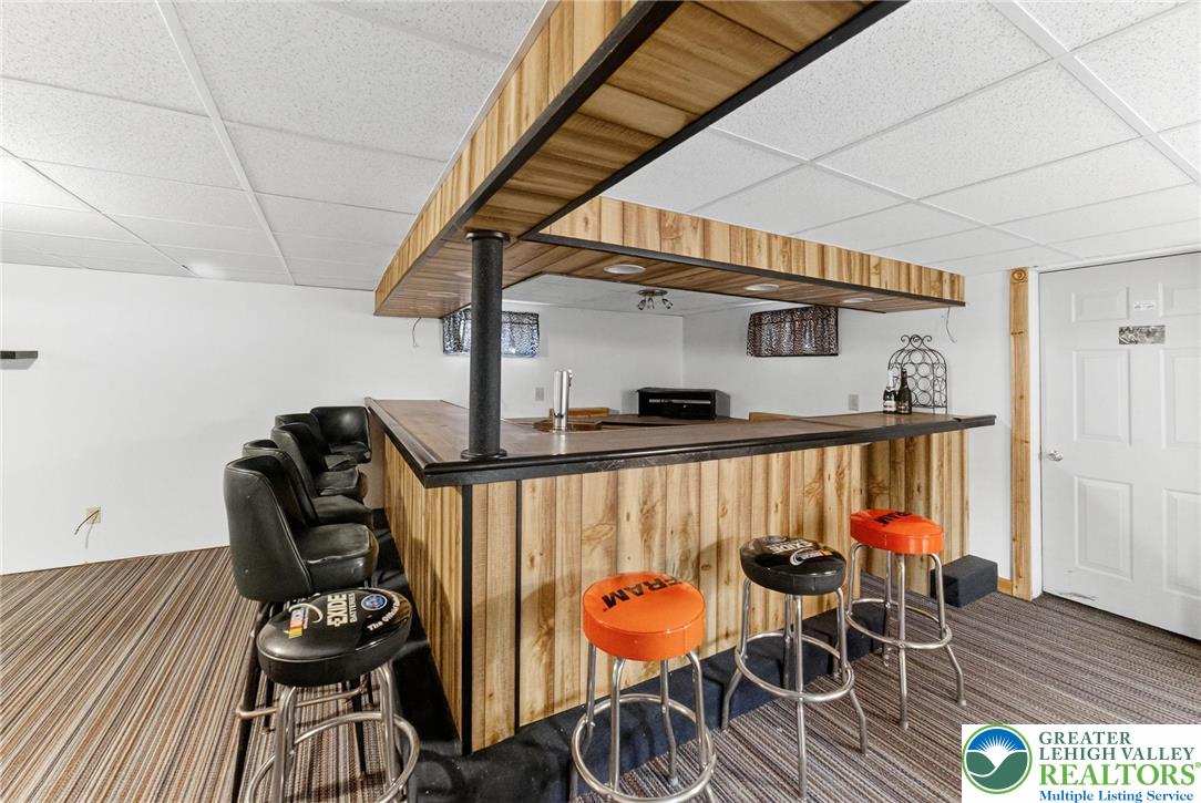 1026 Oak Street Coplay, PA 18037 - Photo 20 of 27 a view of a dining room with furniture and wooden floor