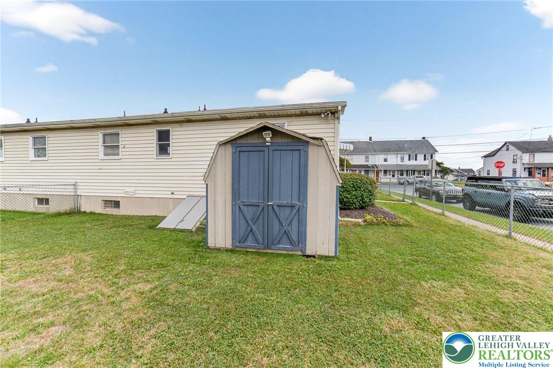 1026 Oak Street Coplay, PA 18037 - Photo 25 of 27 a view of a backyard with a small cabin
