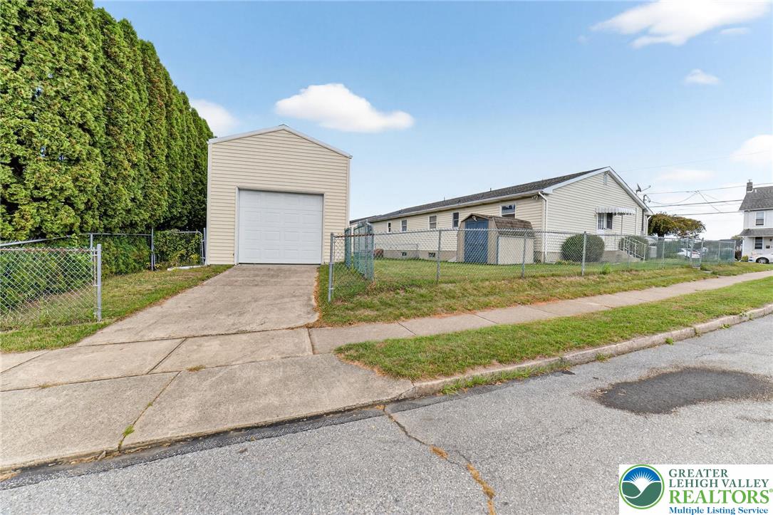 1026 Oak Street Coplay, PA 18037 - Photo 26 of 27 a view of a house with a yard and large tree