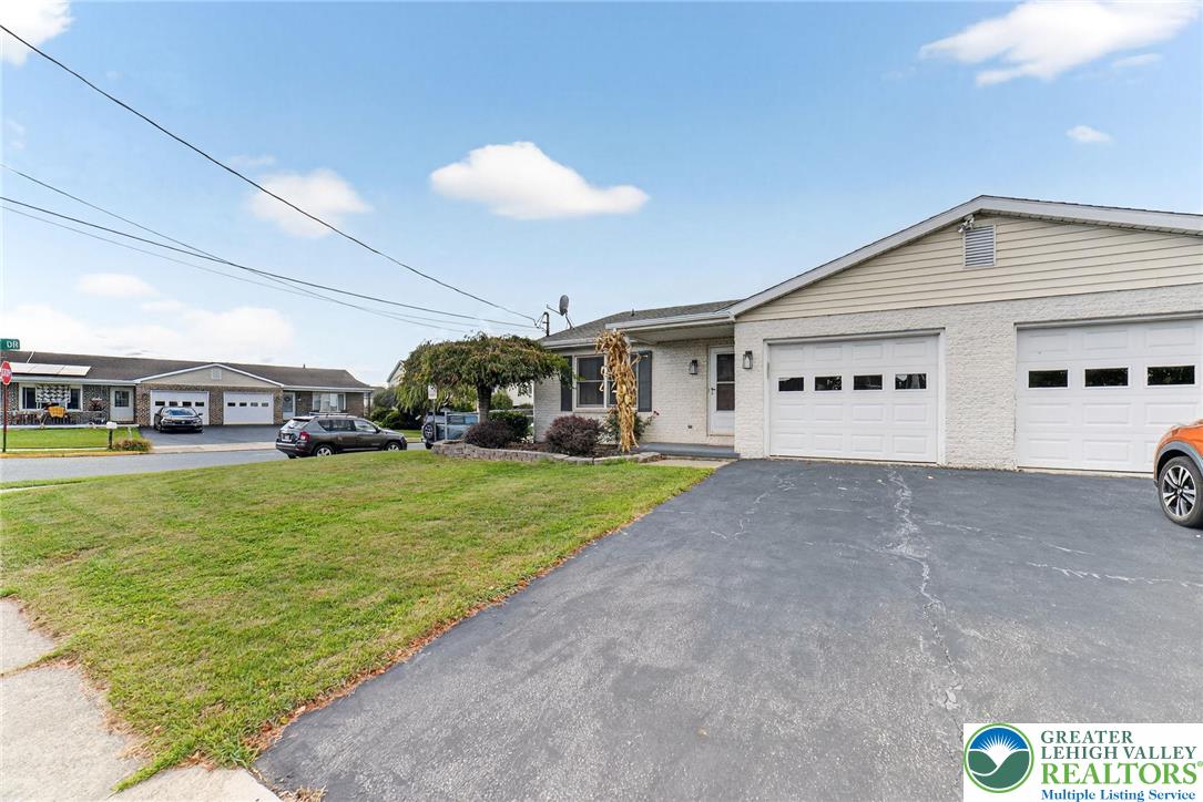 1026 Oak Street Coplay, PA 18037 - Photo 3 of 27 a view of a house with a yard