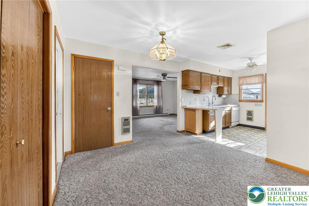 1026 Oak Street Coplay, PA 18037 - Photo 9 of 27 a view of a kitchen with a sink cabinet cabinet and a refrigerator