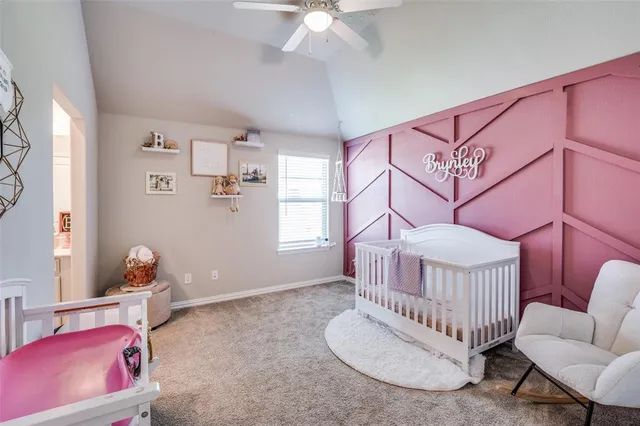 a bedroom with furniture and a wooden floor