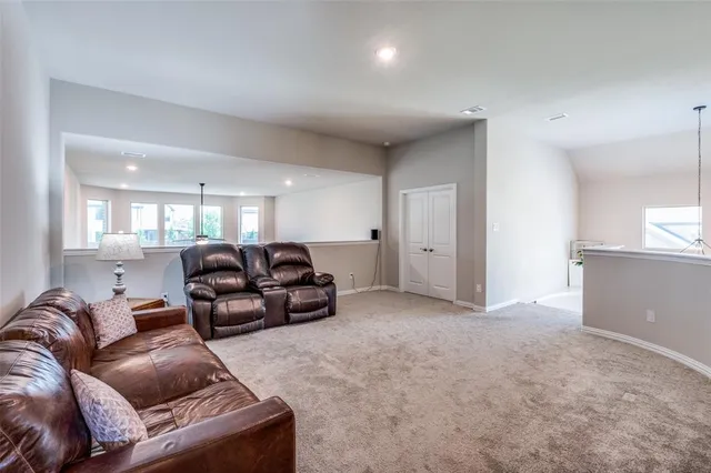 a living room with furniture and a couch