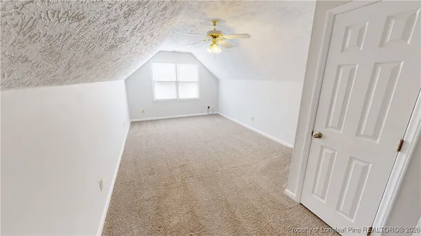 a view of a room with a window