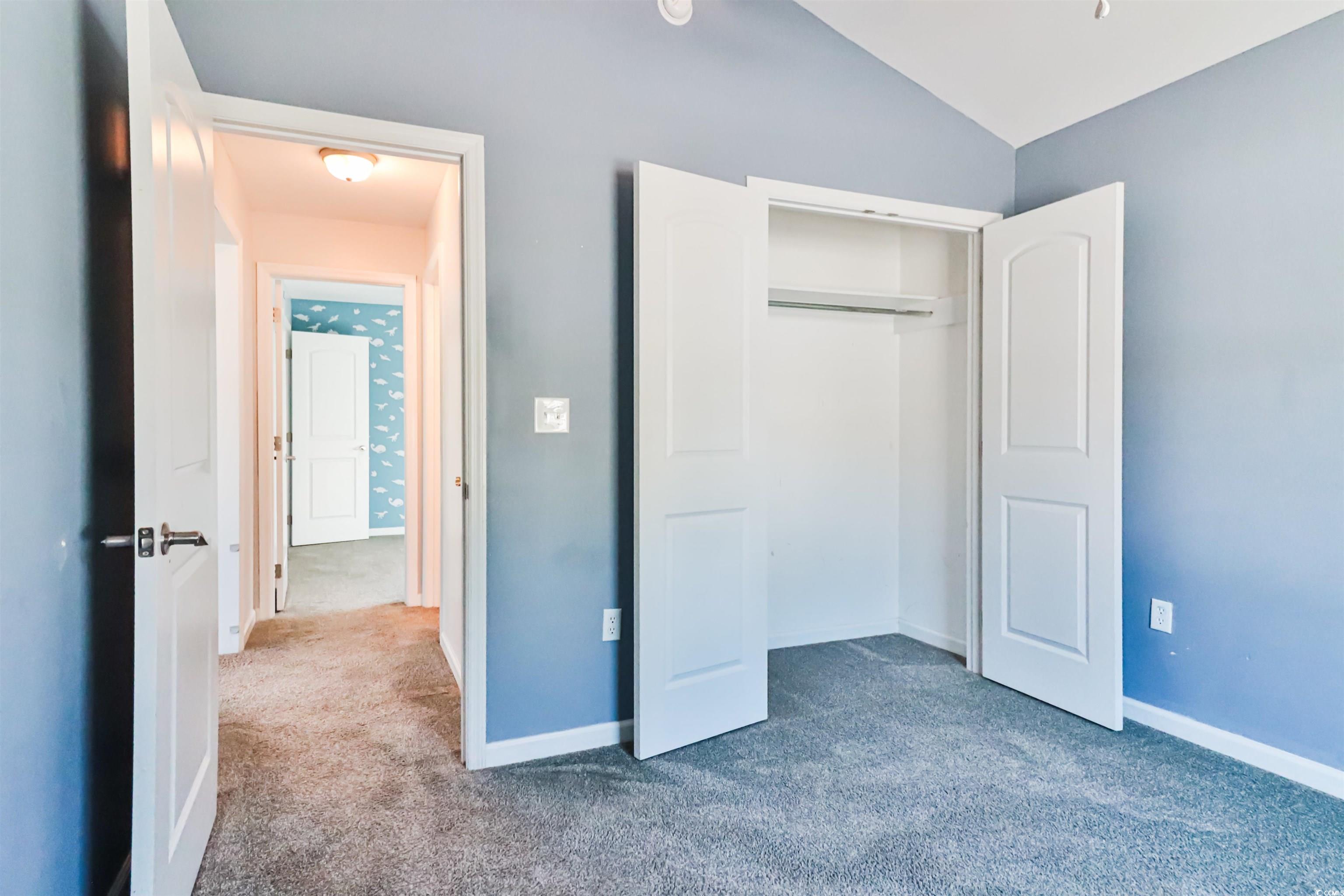139 Hamilton Way Conway, SC 29526 - Photo 17 of 28 Unfurnished bedroom with a closet, vaulted ceiling