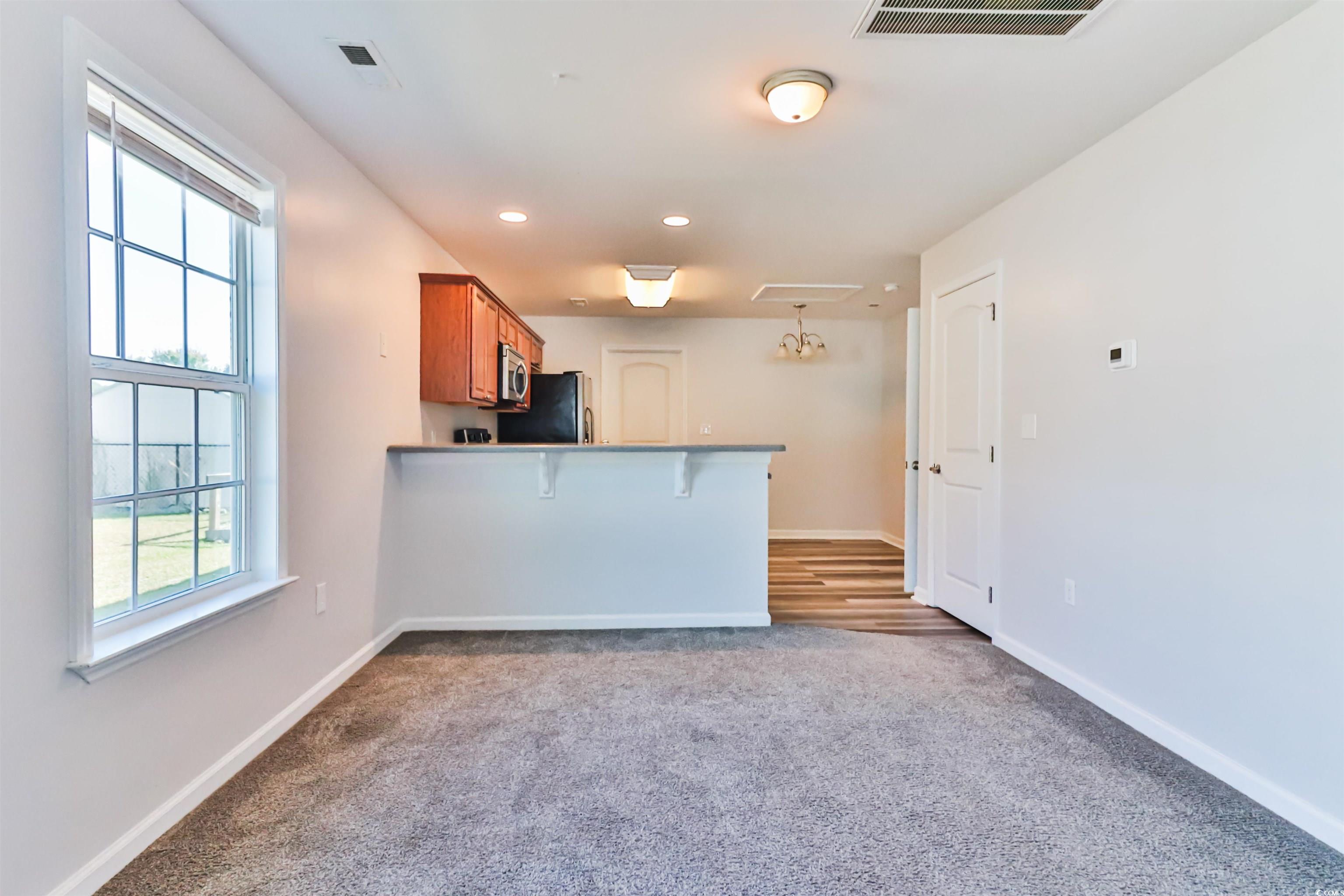 Kitchen with stainless steel appliances, a wealth