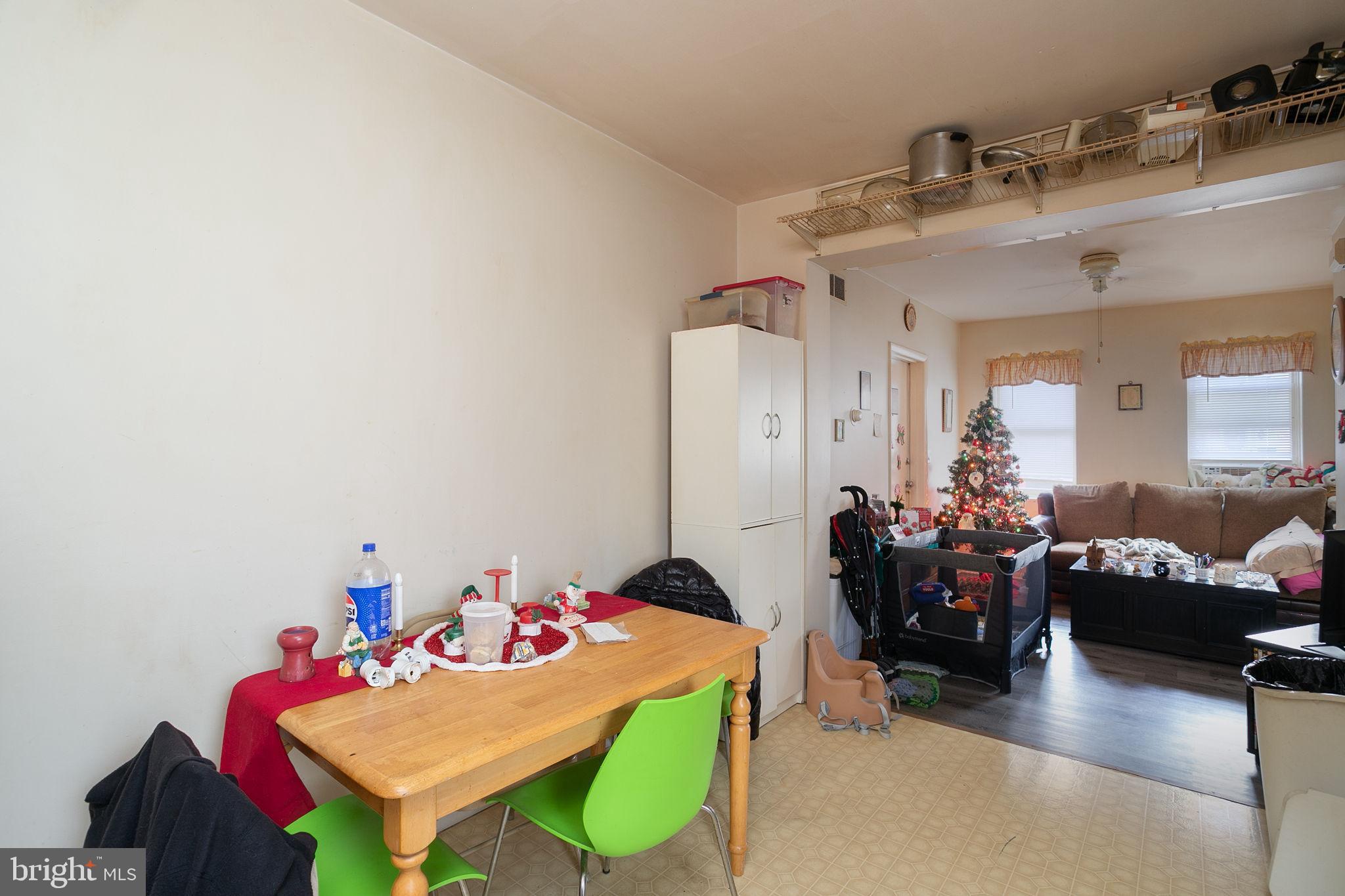 127 Kent Street Trenton, NJ 08611 - Photo 21 of 25 a living room with furniture and a wooden floor