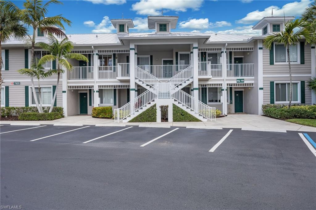 7920 Mahogany Run Lane, Unit 1024 Naples, FL 34113 - Photo 1 of 28 Retreat to the bright and inviting primary suite, where expansive windows fill the space with natural light. Featuring two walk-in closets and direct lanai access