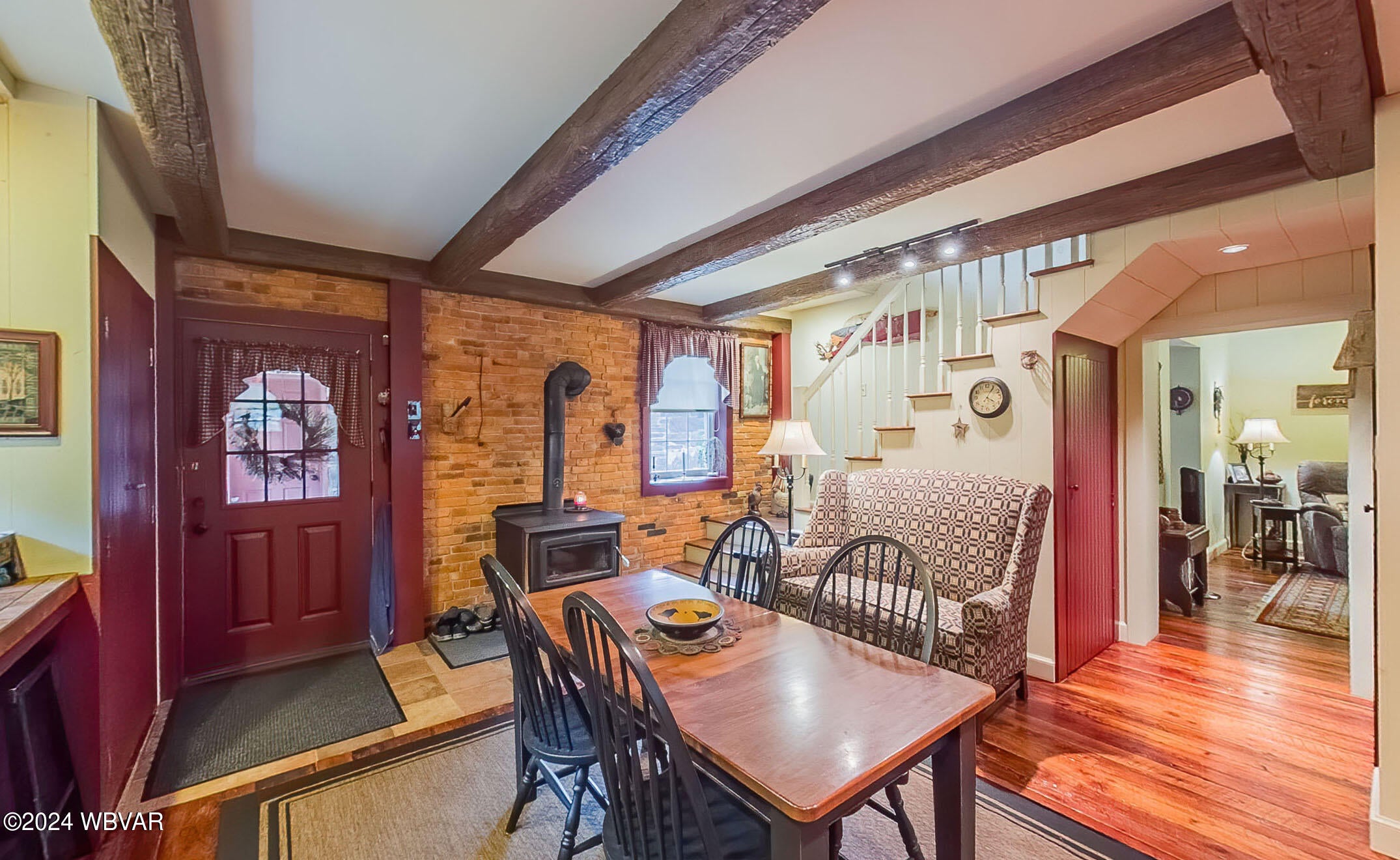 41 Pine Run Road Hughesville, PA 17737 - Photo 14 of 50 Wood stove, open staircase, rear entrance