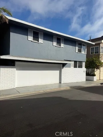 a front view of a house with yard