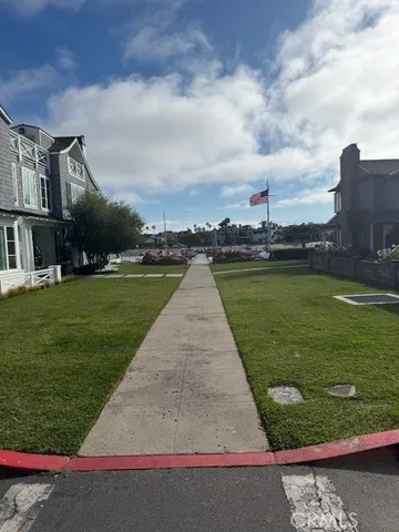 a view of a lake with a yard