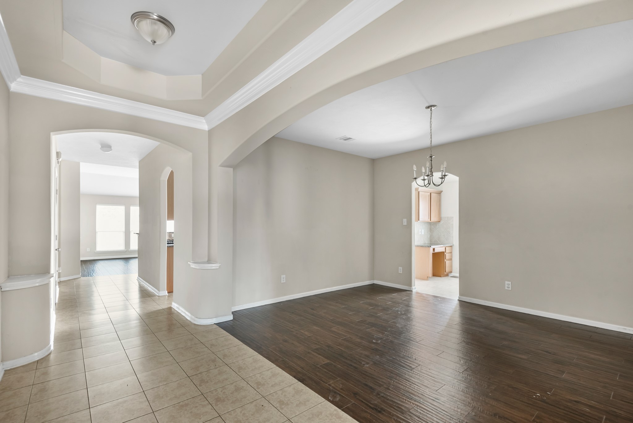 8514 Sweetstone Field Court Cypress, TX 77433 - Photo 11 of 23 a view of an empty room with wooden floor