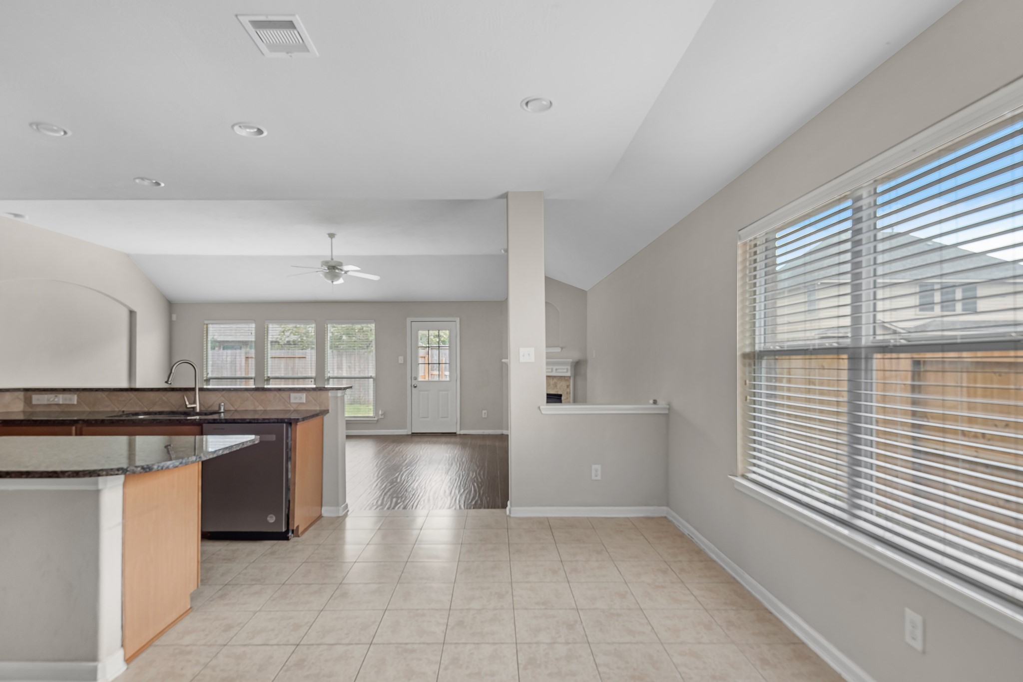 8514 Sweetstone Field Court Cypress, TX 77433 - Photo 6 of 23 a kitchen with a cabinets and a stove