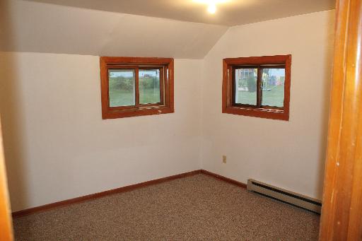 4762 East 2351st Road Somonauk, IL 60552 - Photo 4 of 8 an empty room with a window
