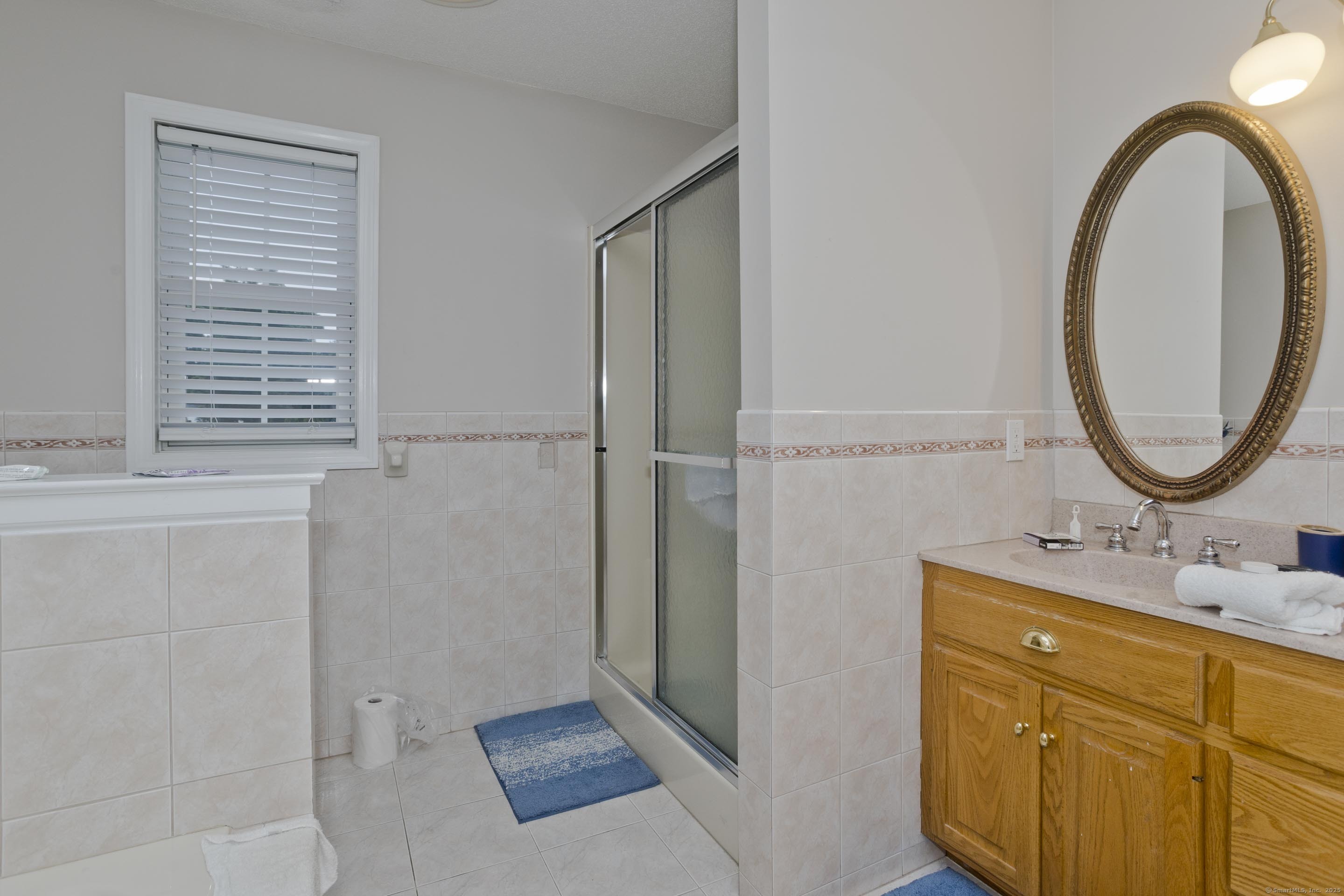 120 Scenic View Drive Middletown, CT 06457 - Photo 12 of 24 a bathroom with a sink and a mirror